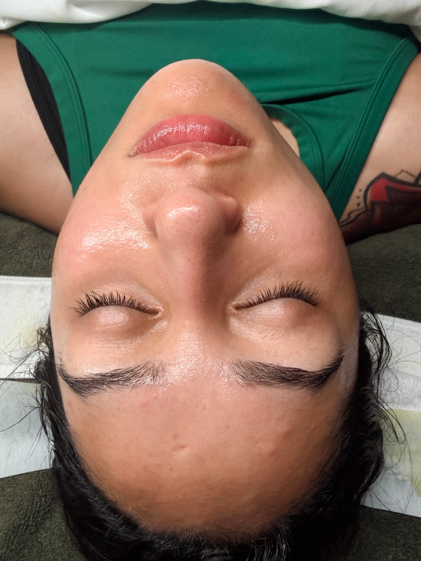 Client with dewy, hydrated skin after a glass-skin hydration facial